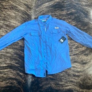 Magellan fishing’s shirts both size medium